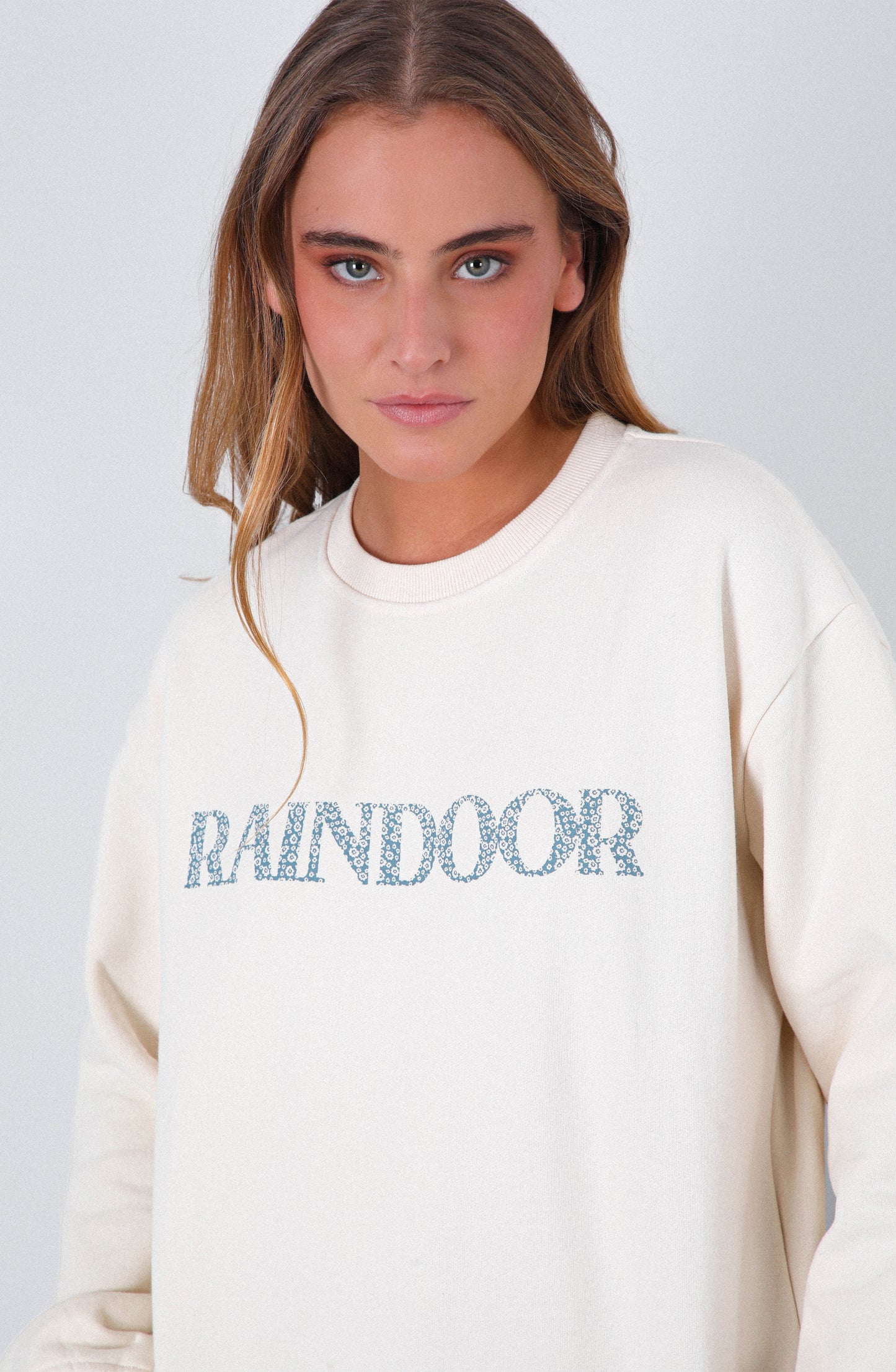 Polerón Crew Neck Logo Parche Bone